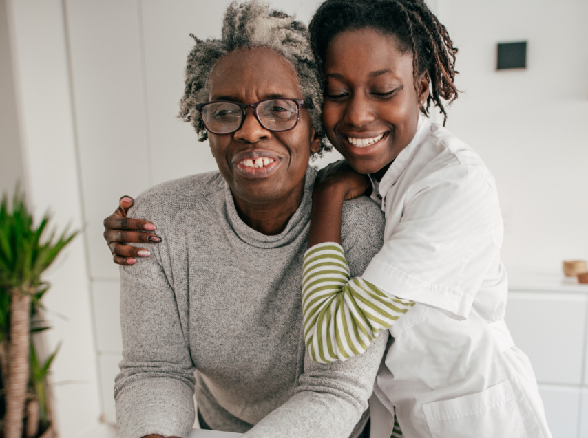 Caregiver hugging the patient